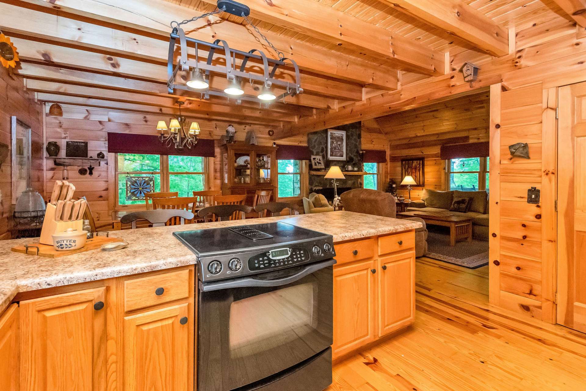 The kitchen features a unique design that allows the family chef to prep and cook while facing the great room's gathering areas.